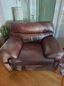 Large brown leather armchair