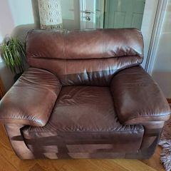 Large brown leather armchair