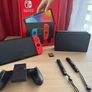 Nintendo Switch OLED (Neon Blue/Red) + Mario Kart 8 Deluxe + Super Mario Bros. W Image 2