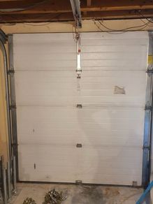 Garage door ; insulated ; original overhead door ; sectional