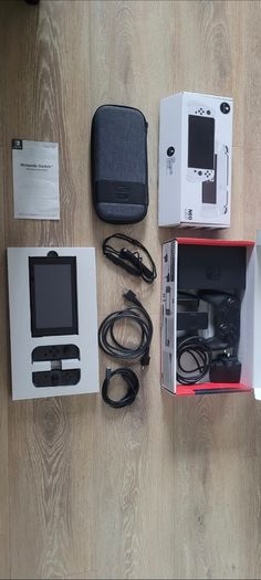 Nintendo Switch V2 Boxed + Official Pro Controller, Travel Case & Skull & Co. NeoGrip