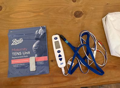 TENS machine plus replacement pads