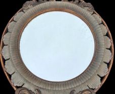 Large bevel edged mirror with ornate moulded frame.