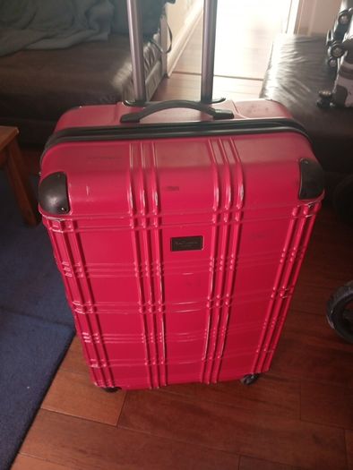 huge suitcase, metallic Shell suitcase, H 78, W 35, 4 rotating wheels, sturdy handle, zips working perfectly,
