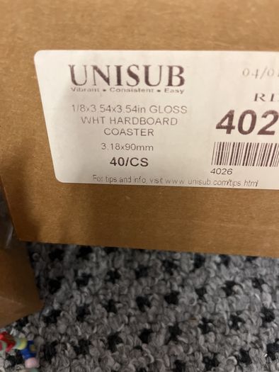 Coasters, plain white, new in box, about sixty five