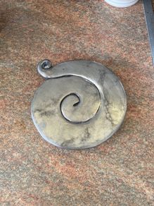 Decorative silver trivet