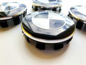 Set of 4 brand new 56mm BMW BLACK / WHITE alloy wheel caps 56