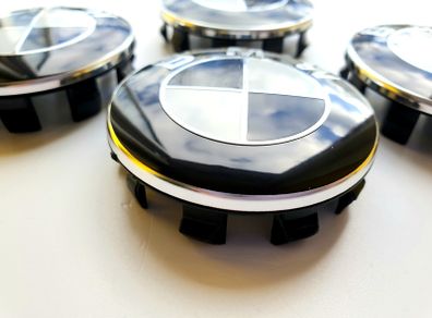 Set of 4 brand new 56mm BMW BLACK / WHITE alloy wheel caps 56