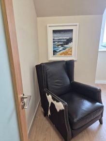 Queen Anne Leather Chair with natural cow hide