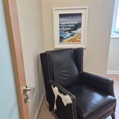 Queen Anne Leather Chair with natural cow hide