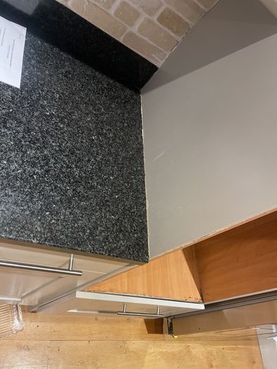 Entire kitchen Quartz work top solid wooden shaker style doors