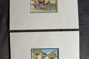 A Pair Of Sealed Mounted Vintage Donald Duck Prints