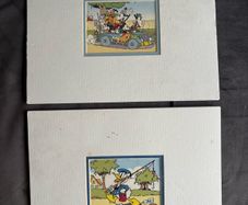 A Pair Of Sealed Mounted Vintage Donald Duck Prints