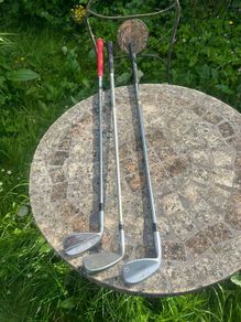 3 golf clubs
