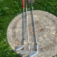 3 golf clubs