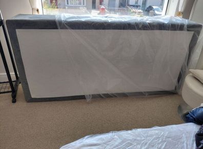Single divan base with 2 pull out drawers  NEW, slight damage to one drawer when it was being transported