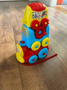 Disney themed pull along toddler train toy
