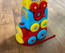 Disney themed pull along toddler train toy