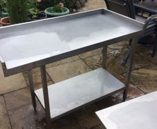 Stainless steel table and shelves