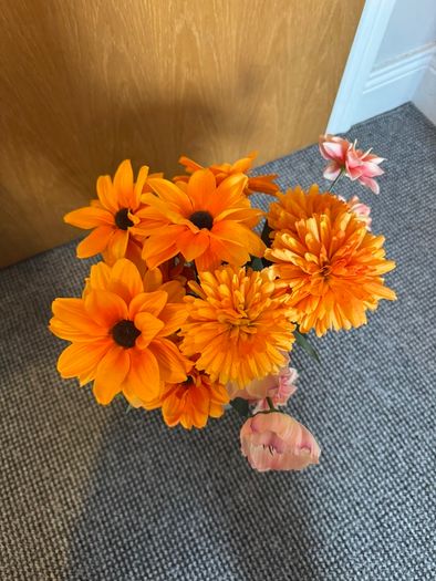 Artificial Orange Flowers in Frosted Glass Vase