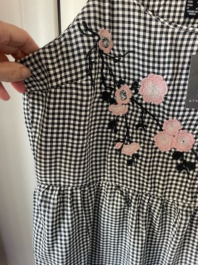 top Bnwt black & white peplum top size 12
