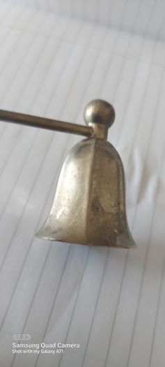 Candle metal snuffer ,,good patina for its age ,sold as seen
