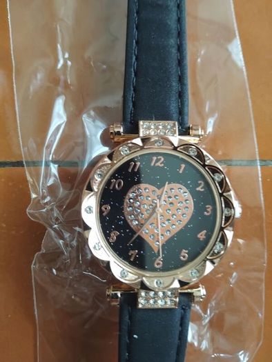 2 womens watches with leather straps