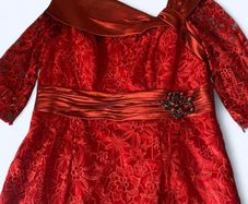 Red dressy dress with brooch detail Size 20