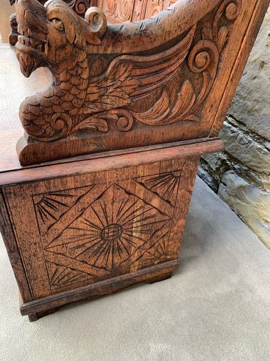 Late Victorian Gothic Revival Carved Oak Hall Settle.