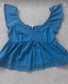 Blue peplum top from Next