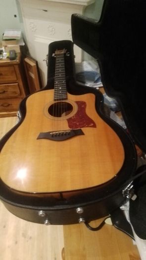 2003 Taylor 310-CE-L1. Limited edition. Koa back and sides. Includes OHSC.