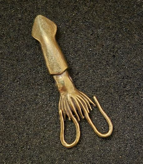 3 brass fish.