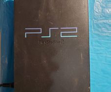 Playstation 2 Model SCPH-30003 R, Powers on and off, Opens and closes disk tray, Comes with power lead only