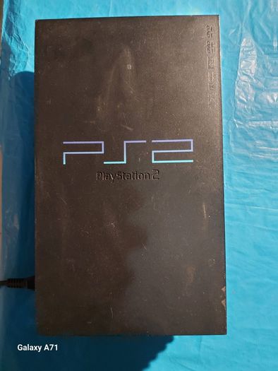 Playstation 2 Model SCPH-30003 R, Powers on and off, Opens and closes disk tray, Comes with power lead only