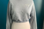Cropped jumper with design on back. Size S