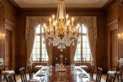 Large old heavy brass and glass chandelier