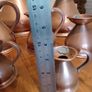 vintage copper measure jug collection Image 3