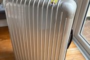 Large silver 30inch suitcase (not carry on)