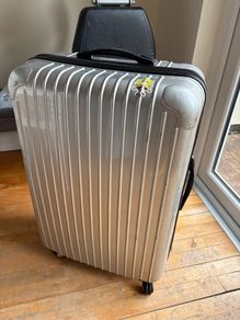 Large silver 30inch suitcase (not carry on)