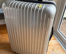 Large silver 30inch suitcase (not carry on)