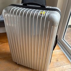 Large silver 30inch suitcase (not carry on)