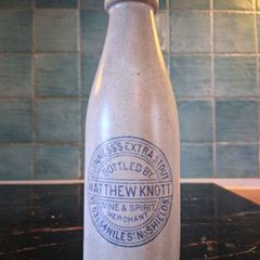Guinness stoneware stout bottle