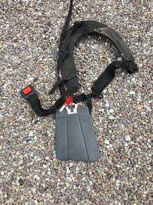 Safety harness for garden equipment