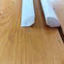Two 2.4m lengths of white wooden moulding 10x10mm Image 2