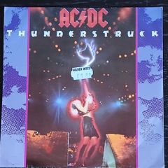 A C / Dc 7"