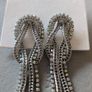 Silver Chandelier Earrings with Knots and Rhinestones Image 3