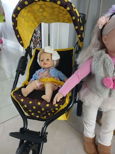 dolls and  buggy