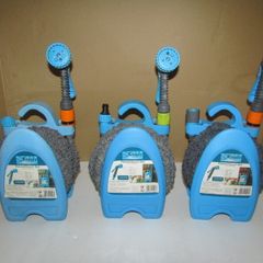 Flexible hose including wall holder