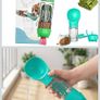 Pet 4 in 1 multifunctional water bottle,  treat dispenser, and waste disposal Image 3