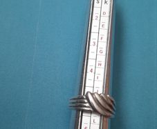 Silver ring clasping hands